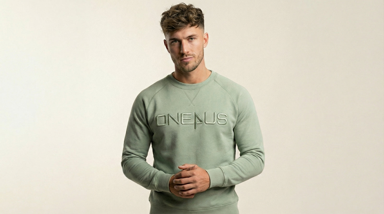 Catalog man wearing a One4US sweater