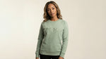 Catalog woman wearing a green sweatshirt with 'One4Us' text on a beige background